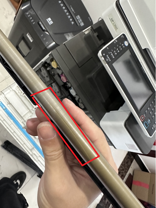 理光复印机充电辊裂开.png